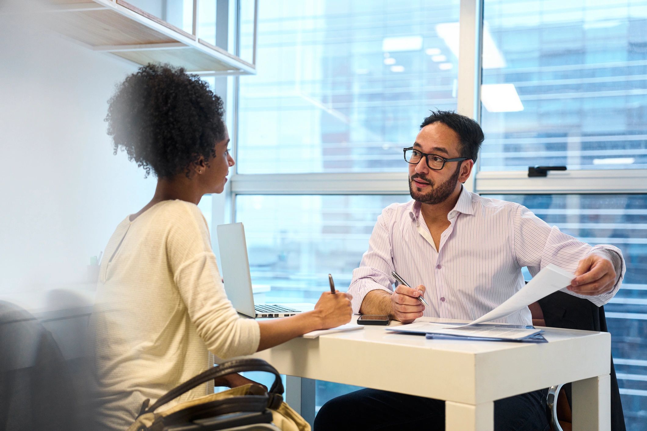 Travel advisor consulting with a client