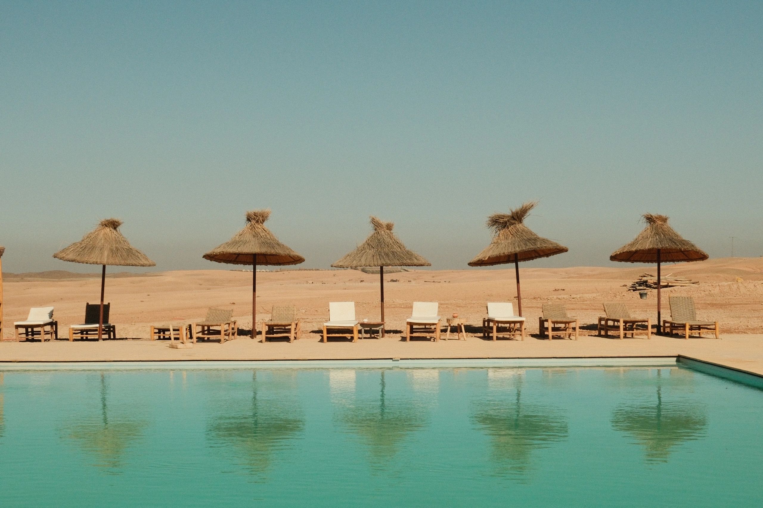 Luxury resort pool with loungers